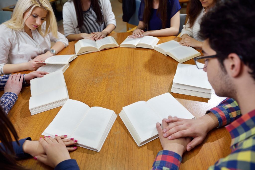 happy teens group in school